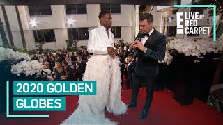 Billy Porter's Angelic Globes Look Includes a White Feather Train | E! Red Carpet & Award Shows