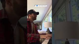 Chris Evans playing the piano