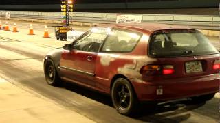 k-phonix  stock ( J series ) hatch VS Modded Evo 9   ( 8.0 @ 8th Mile )