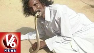 Snake Man Venkateswarlu - Eats Snakes head, Drinks Snake Venom