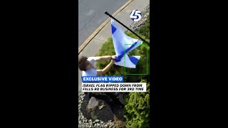 Israel flag torn down from Falls Rd business again