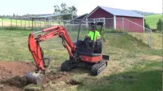 Hitachi Zaxis 35U Compact Excavator digging in clay  trenching