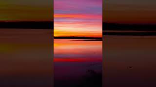 Stunning sunrise over lake with cloud reflections  #dronev #partlycloudy #sunrise #reflection