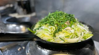 Ingredients  that stick out of the wok.You may be surprised, but these will be spring rolls