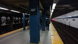 R160 #9312 (R) + R160 #8677 (R) at Jackson Heights - Roosevelt Avenue