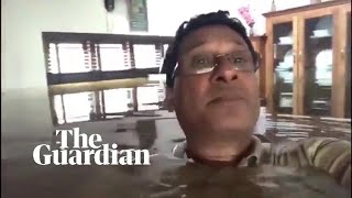 Kerala floods: man, neck-deep in water, appeals for help from inside his house