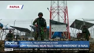 Pulihkan Telekomunikasi Di Papua, Satgas Yonif Raider 303 Kostrad Bantu Perbaikan Tower