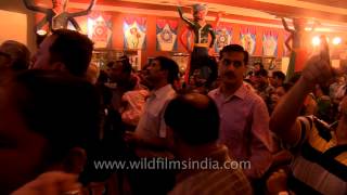 Crowd gathers for Aarti: Maha Sashthi in Durga Puja