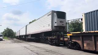 CSX 877 ES44AH leads CSX I032 with the CSX  Seaboard heritage unit Trailing!