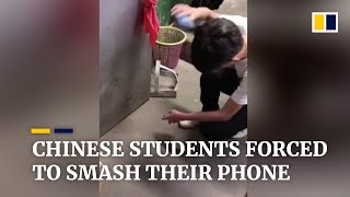 Chinese students forced to smash their phones in school