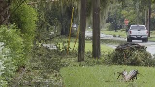 Residents in Sanford, Florida survey damage after Hurricane Milton