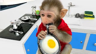 Baby monkey Bim Bim goes to the supermarket to buy kitchen utensils and eats eggs with puppy
