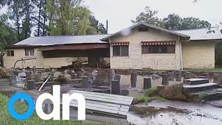 Australian cyclone kills three and causes millions of dollars of damage