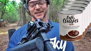 BIG Man Shoots Weird Guns at GALLONS of Pudding...