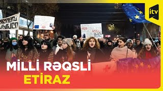 Tbilisidə aksiyaçılar rəqs edərək etiraz edir