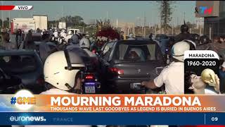 Football legend Maradona buried as thousands mourn in Buenos Aires