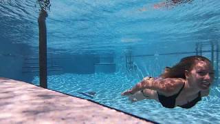 @TrinaMason swimming laps underwater at the miami yacht club pool