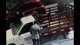 Ladrón forzó puerta de carro y se llevó un millonario botín en Bogotá - Ojo de la noche