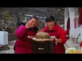 xia jie in northern shaanxi xia jie made ”pig head meat and steamed buns” for liang liang. it was