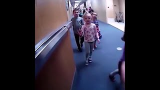 Video: Children give police officer high-fives at Oklahoma school