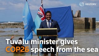 Tuvalu minister gives COP26 speech from the sea