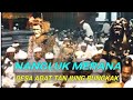 NANGLUK MERANA DESA ADAT TANJUNG BUNGKAK