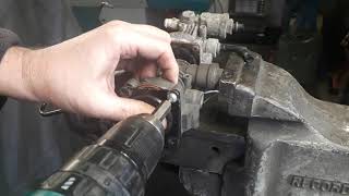 Land Rover Hitachi or Dunlop Air suspension air compressor Exhaust Valve Removal