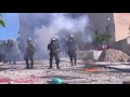 man catches fire during greek police clashes