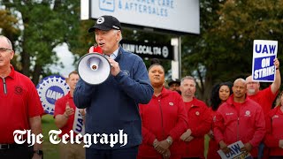 President Biden joins picket line with striking car manufacturing workers