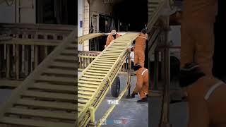 The process of loading a car into a train carriage- Satisfying jobs and machinery in the world