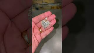 Big heart pendant 10Kt gold with 5.5 cts of round and baguette VS diamonds.