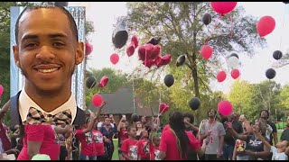 Vigil held to honor 21-year-old shot and killed in robbery last weekend