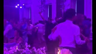 Sam Heughan and his girlfriend Steph French née Bullock dancing at Rik Rankin's wedding