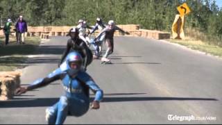 Downhill skateboarding competition in Canada