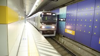 Tokyo, Japan - Tokyo Waterfront Area Rapid Transit Rinkai Line Trains at Tennōzu Isle Station