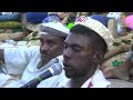 young men dance at a wedding singing to the artist ismail gohar