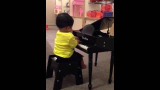 Playing piano in Neiman Marcus
