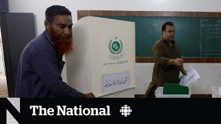 Election underway in Pakistan as 2 bomb blasts kill dozens