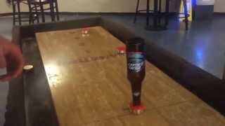 Hardest shuffleboard trick-shot in the world