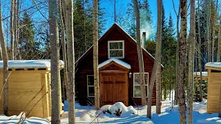 Log Cabin built in the North,got stuck and had to walk in the snow,getting the doors done?