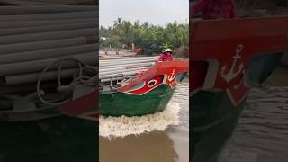 Ghe sắt vượt Cống/Boat crossing the dam.