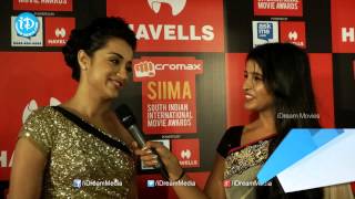 Trisha Reveals her Next Movie in Telugu & Honour to Work with Chiranjeevi @SIIMA 2014