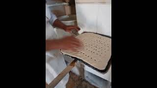 How skillfully the baker prepares the dough to become bread