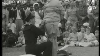 SOUTH AFRICA: Military and civilians relax on the beach at Durban (1943)