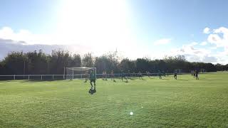 Horsford Veterans no.9 Grant Holt come close with the header from the corner.