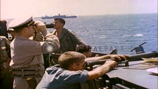 Bombing by the US troops, Landing Craft Vehicles lowered and Landing Craft Person...HD Stock Footage