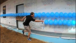 Man pops 200 balloons in 14.77 seconds - World Record