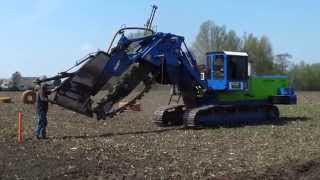 Inter-Drain 1824T Chain Trencher | laying field drainage | Combi Drain B.V.