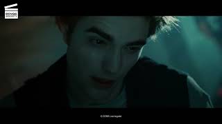 Edward sucks the vampire venom out of Bella's body