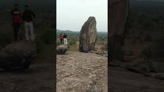 Heavy rock fixed in slope amazingly at shiv mandir reghamunda amga in odisha